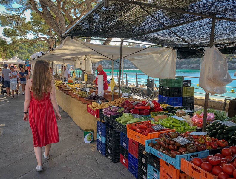 The sidewalk shops are running their business following all the rules